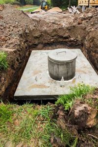 A septic tank system that is being dug up